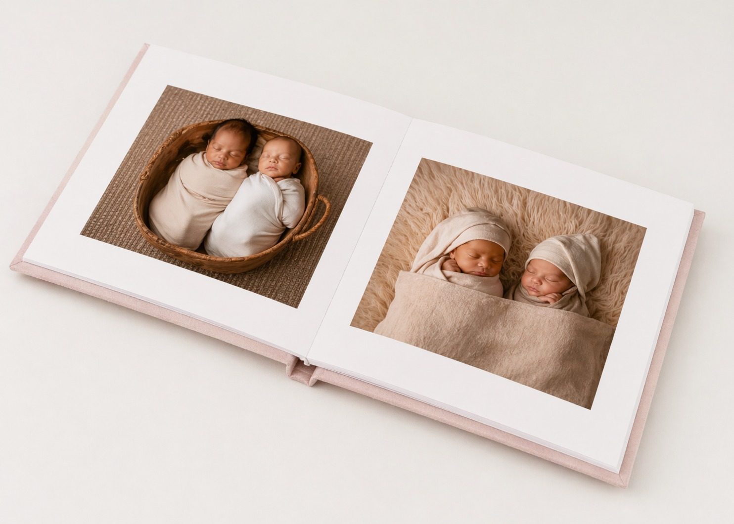 Open Fox Photo album showing newborn portraits
